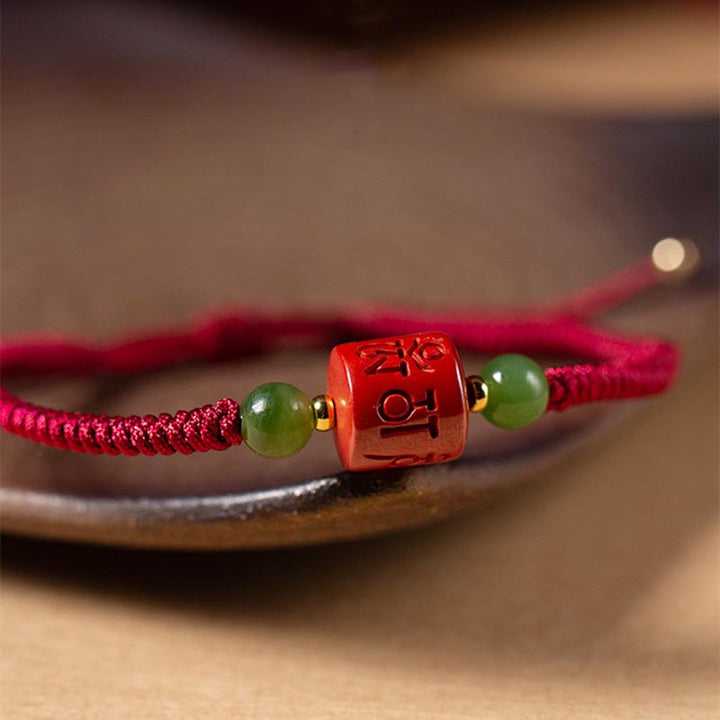 Bracelet en corde tressée avec bénédiction gravée Om Mani Padme Hum et Buddha Stones Tibetam Cinnabar