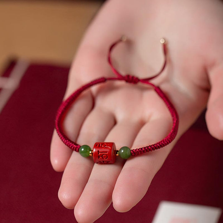 Bracelet en corde tressée avec bénédiction gravée Om Mani Padme Hum et Buddha Stones Tibetam Cinnabar