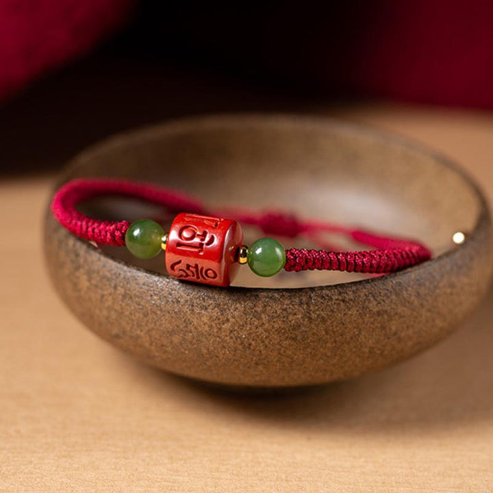 Bracelet en corde tressée avec bénédiction gravée Om Mani Padme Hum et Buddha Stones Tibetam Cinnabar