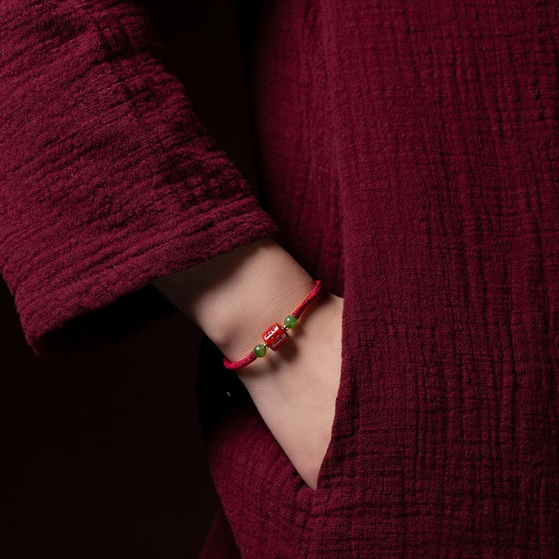 Bracelet en corde tressée avec bénédiction gravée Om Mani Padme Hum et Buddha Stones Tibetam Cinnabar