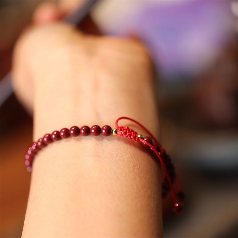 Bracelet de cheville tressé en fil rouge avec bénédiction en cinabre naturel et Buddha Stones