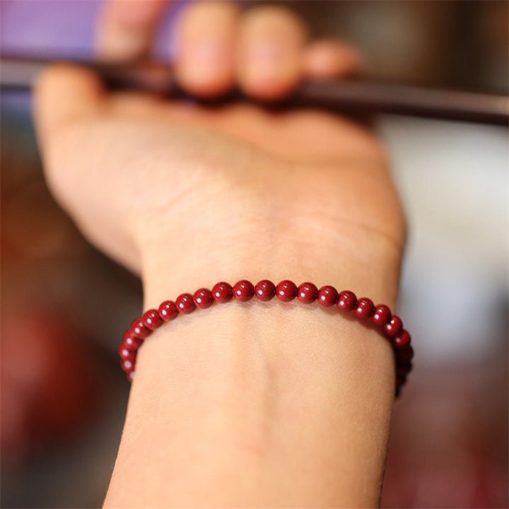Bracelet de cheville tressé en fil rouge avec bénédiction en cinabre naturel et Buddha Stones