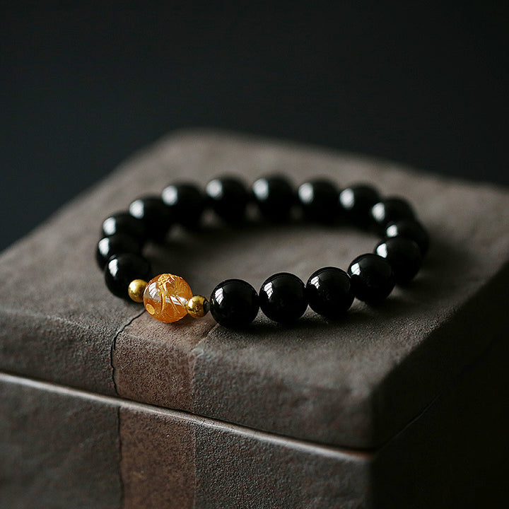 Bracelet force du dragon en onyx noir et cristal blanc en obsidienne noire naturelle de Buddha Stones