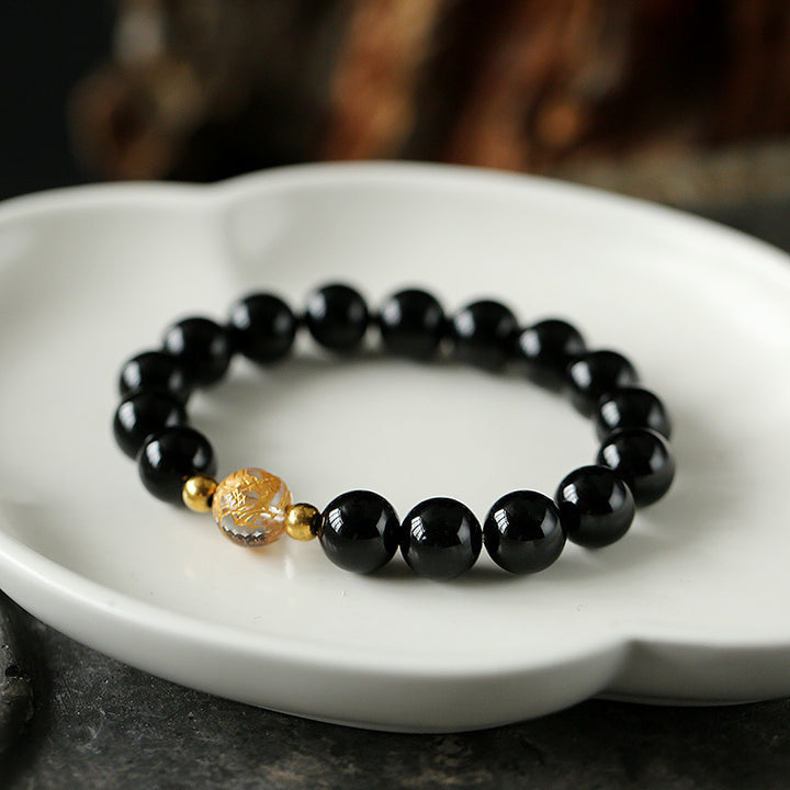 Bracelet force du dragon en onyx noir et cristal blanc en obsidienne noire naturelle de Buddha Stones