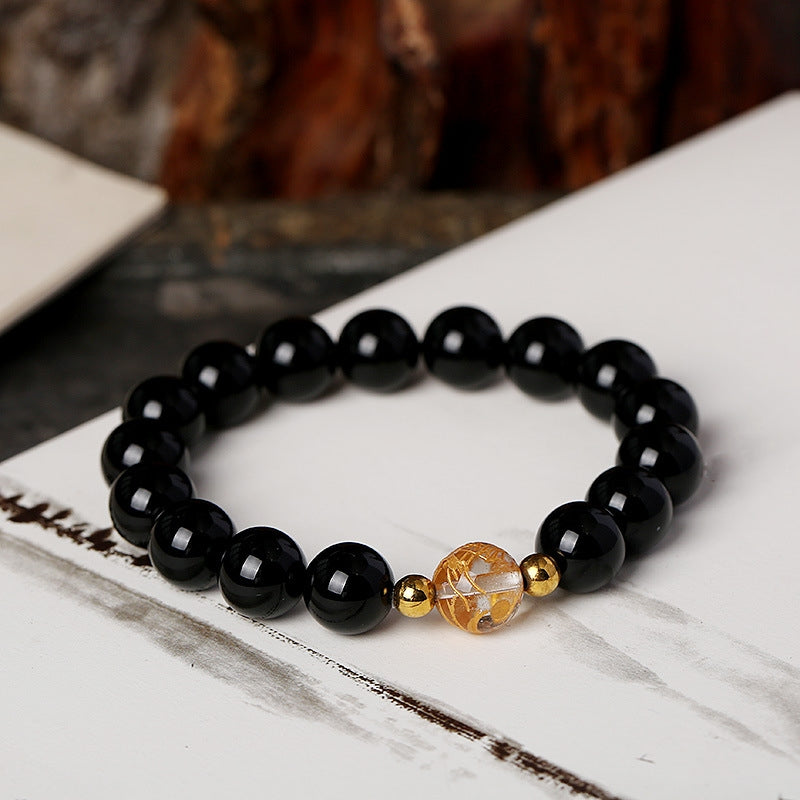 Bracelet force du dragon en onyx noir et cristal blanc en obsidienne noire naturelle de Buddha Stones