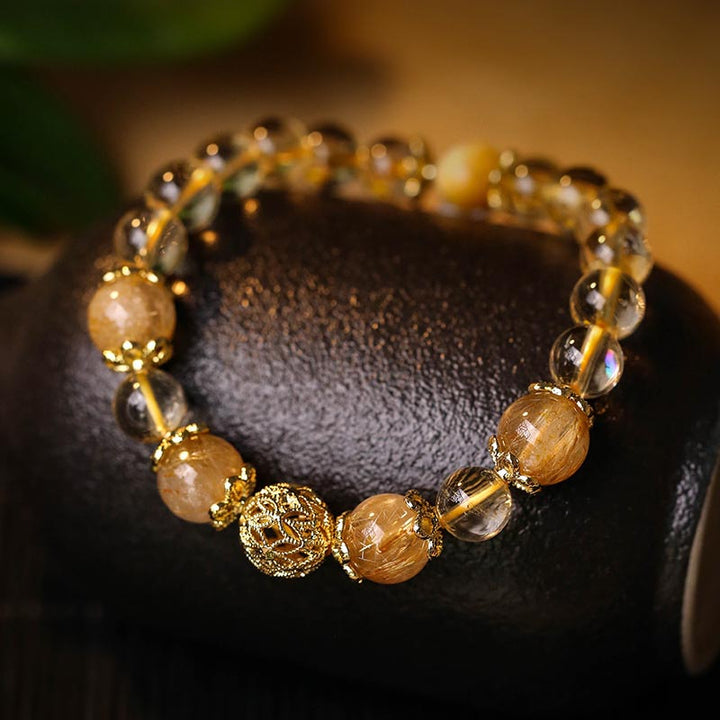Bracelet de protection de la prospérité en quartz rutile et améthyste naturelle de Buddha Stones