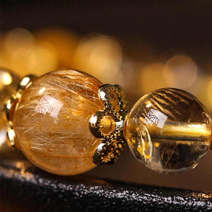 Bracelet de protection de la prospérité en quartz rutile et améthyste naturelle de Buddha Stones