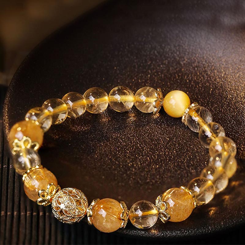 Bracelet de protection de la prospérité en quartz rutile et améthyste naturelle de Buddha Stones