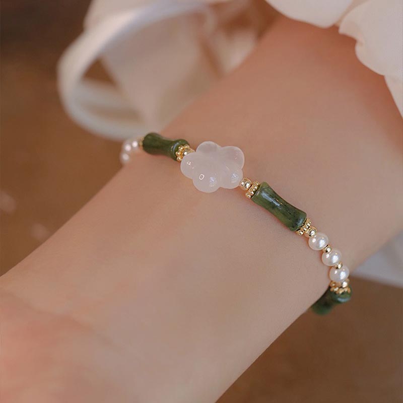 Bracelet de paix en perles d'agate et de fleur de bambou avec Buddha Stones et péridot
