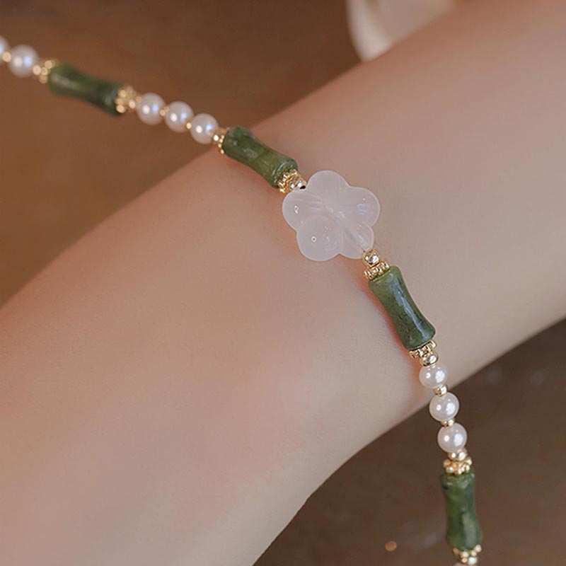 Bracelet de paix en perles d'agate et de fleur de bambou avec Buddha Stones et péridot