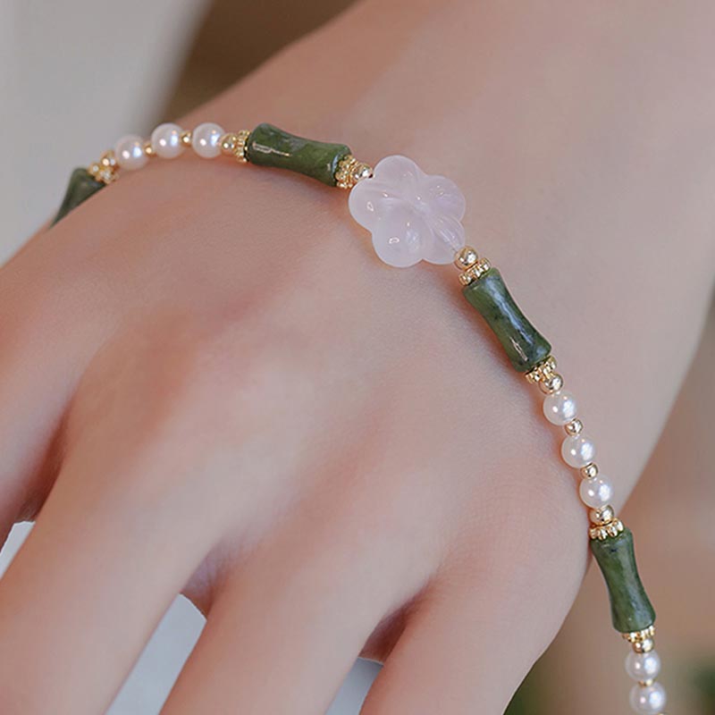 Bracelet de paix en perles d'agate et de fleur de bambou avec Buddha Stones et péridot