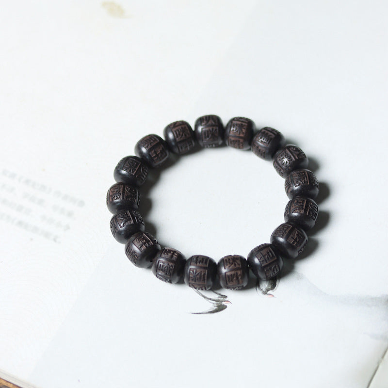 Bracelet d'équilibre gravé en bois d'ébène du Tibet Buddha Stones Om Mani Padme Hum