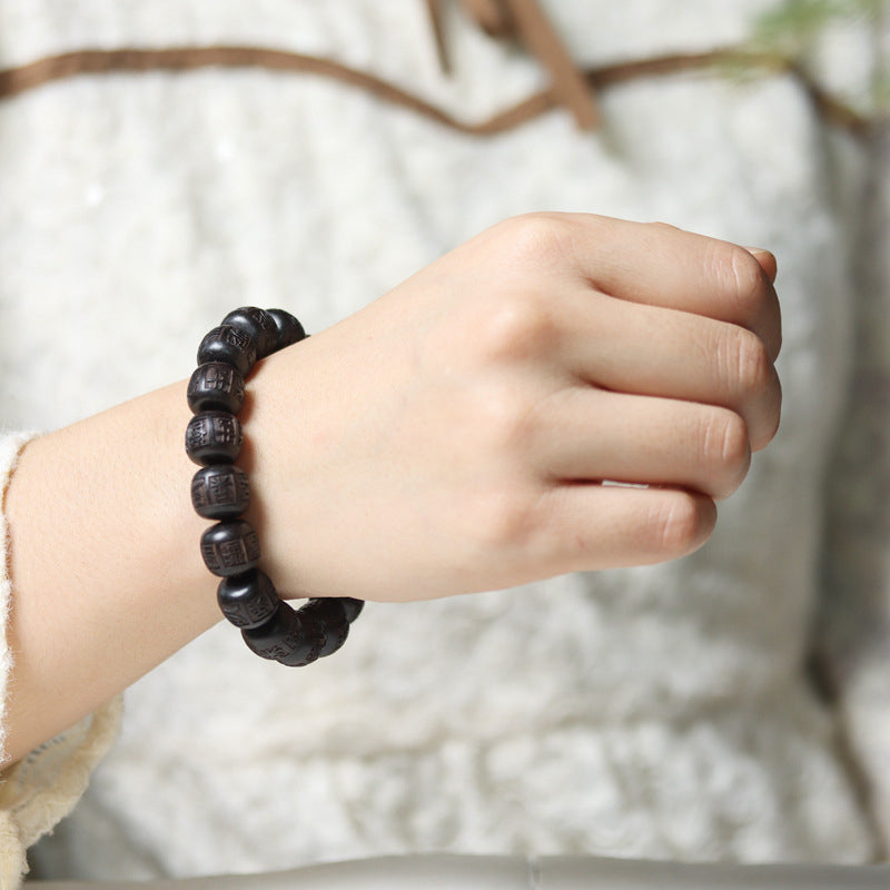 Bracelet d'équilibre gravé en bois d'ébène du Tibet Buddha Stones Om Mani Padme Hum