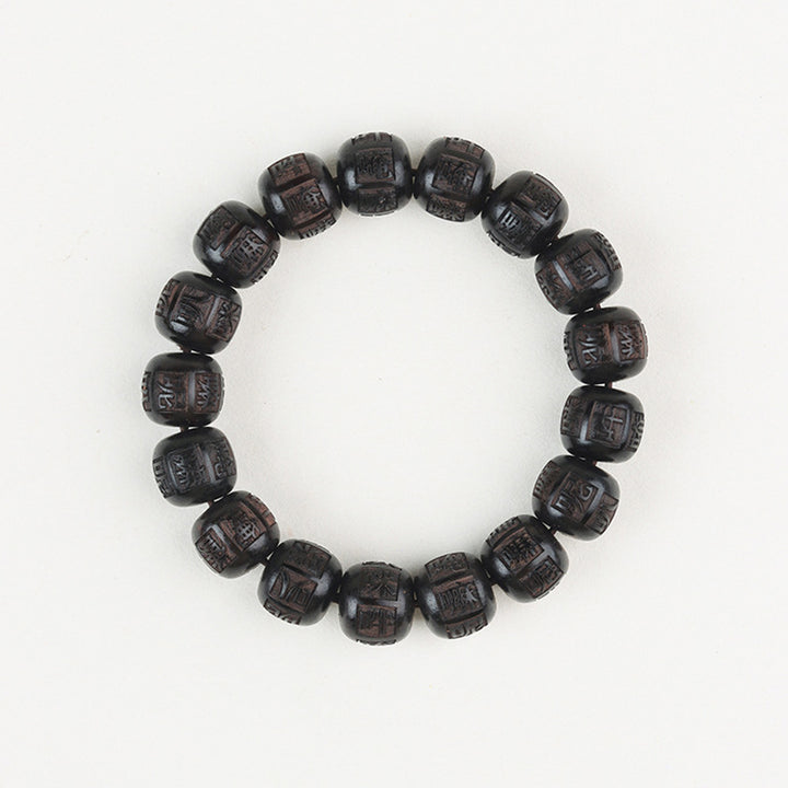 Bracelet d'équilibre gravé en bois d'ébène du Tibet Buddha Stones Om Mani Padme Hum