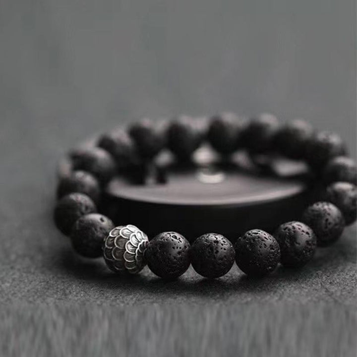 Bracelet de guérison en perles de pierre de lave et écailles de poisson en Buddha Stones