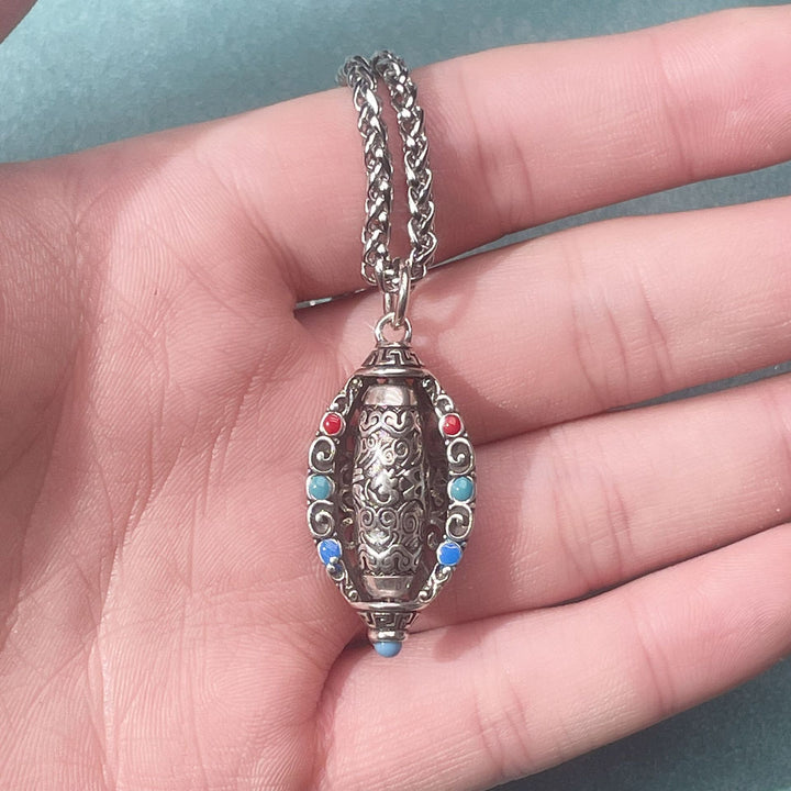 Collier pendentif rotatif en Buddha Stones tibétain Om Mani Padme Hum Pureté