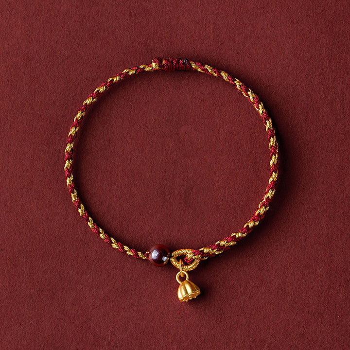 Bracelet tressé en corde d'or rouge fabriqué à la main par Buddha Stones avec breloque Lotus Peace And Joy