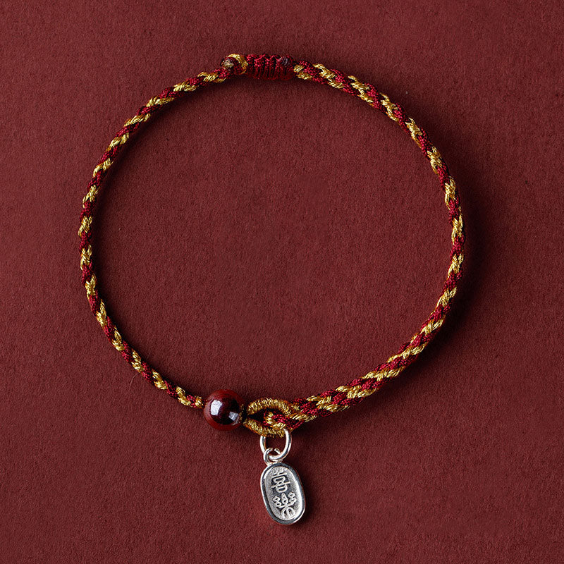 Bracelet tressé en corde d'or rouge fabriqué à la main par Buddha Stones avec breloque Lotus Peace And Joy