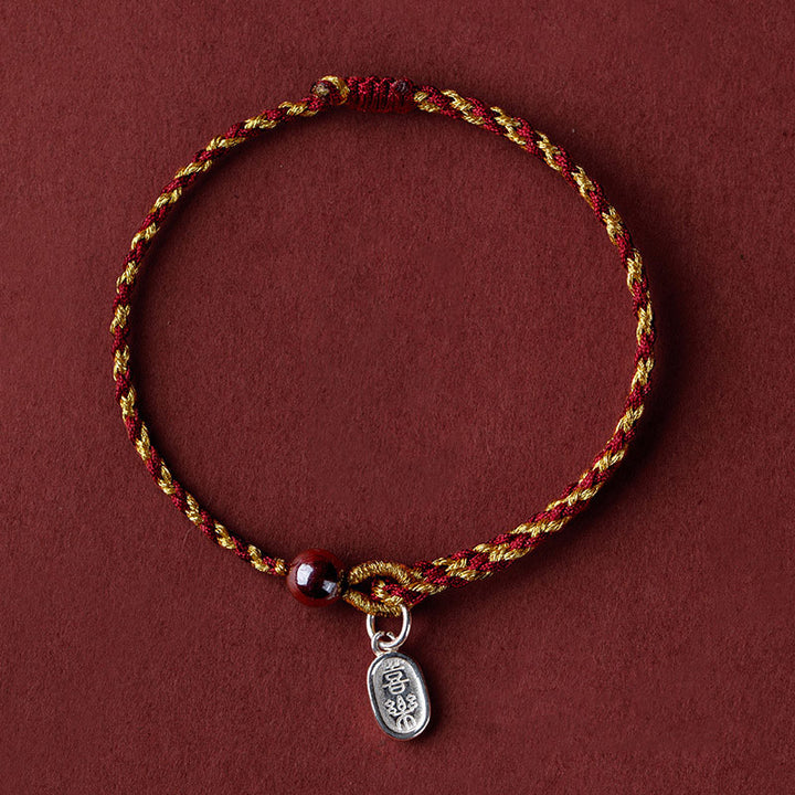 Bracelet tressé en corde d'or rouge fabriqué à la main par Buddha Stones avec breloque Lotus Peace And Joy