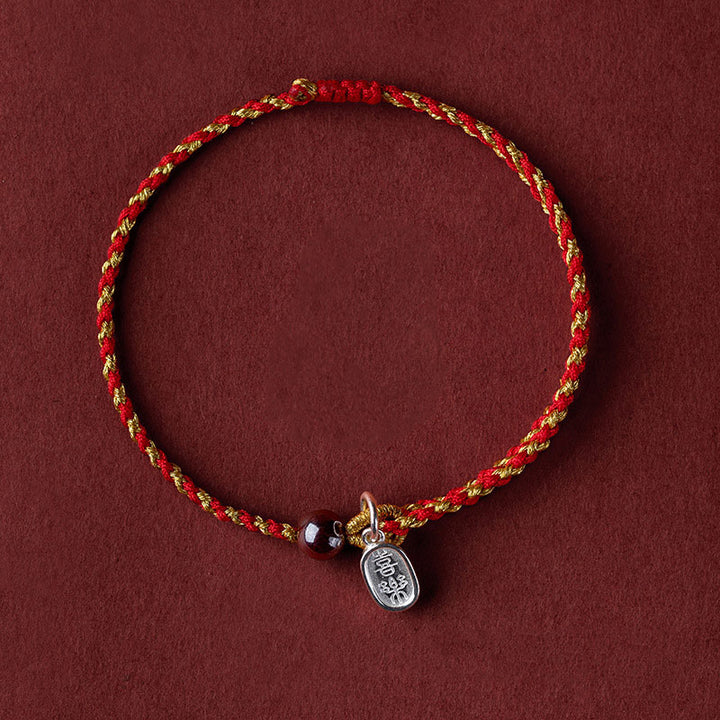 Bracelet tressé en corde d'or rouge fabriqué à la main par Buddha Stones avec breloque Lotus Peace And Joy