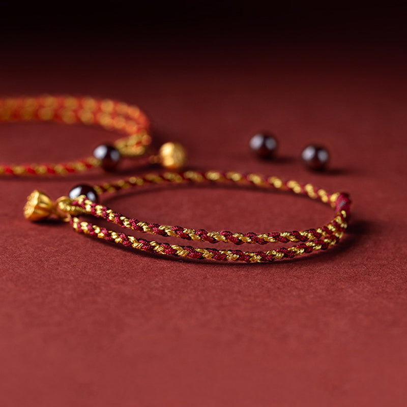 Bracelet tressé en corde d'or rouge fabriqué à la main par Buddha Stones avec breloque Lotus Peace And Joy
