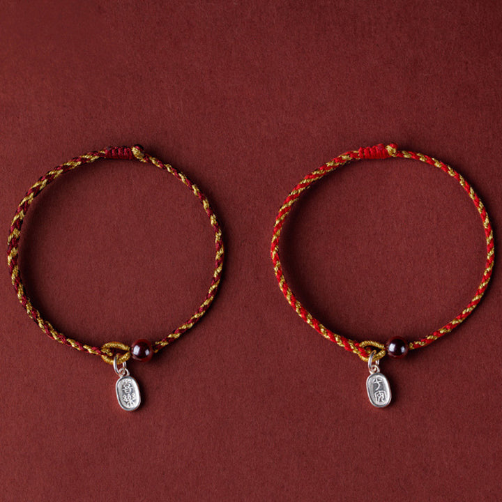 Bracelet tressé en corde d'or rouge fabriqué à la main par Buddha Stones avec breloque Lotus Peace And Joy