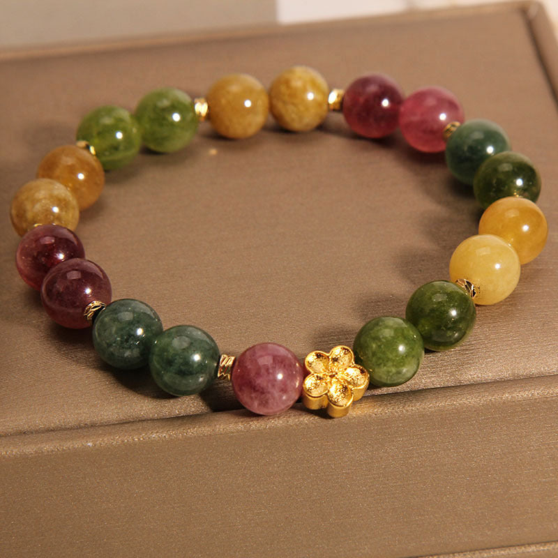 Bracelet positif en Buddha Stones avec tourmaline colorée naturelle et fleur dorée