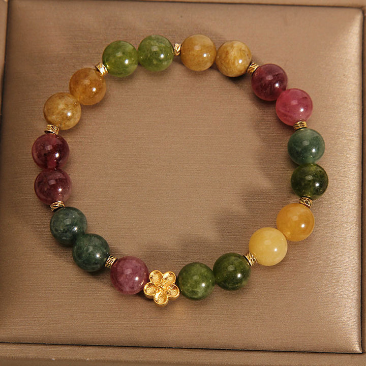 Bracelet positif en Buddha Stones avec tourmaline colorée naturelle et fleur dorée