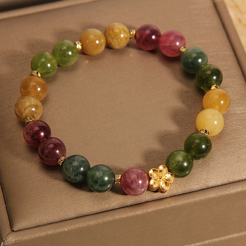 Bracelet positif en Buddha Stones avec tourmaline colorée naturelle et fleur dorée