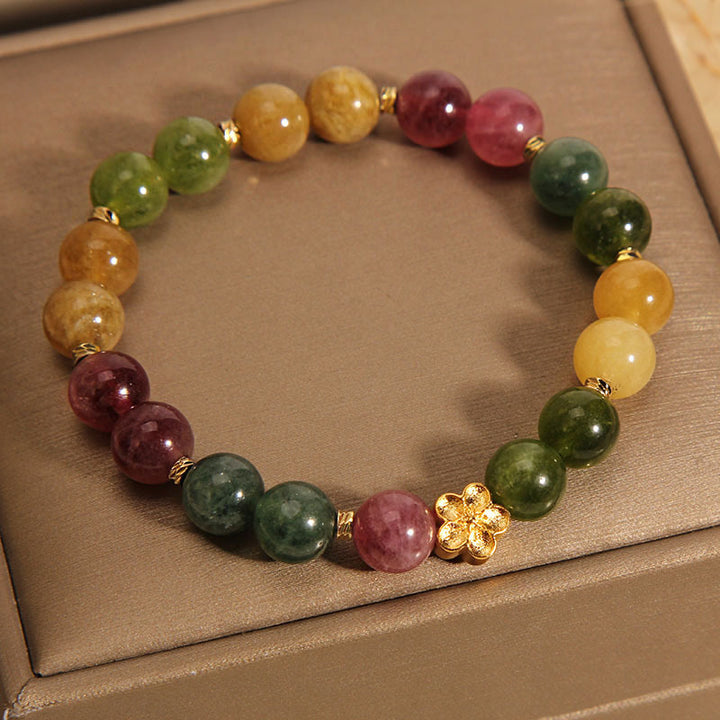 Bracelet positif en Buddha Stones avec tourmaline colorée naturelle et fleur dorée