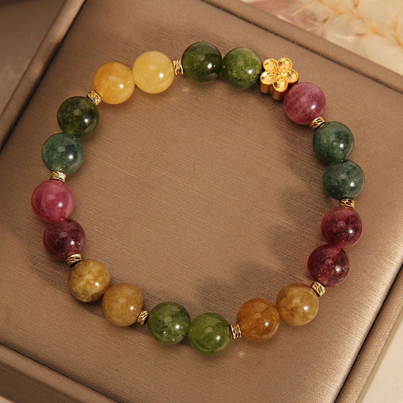 Bracelet positif en Buddha Stones avec tourmaline colorée naturelle et fleur dorée