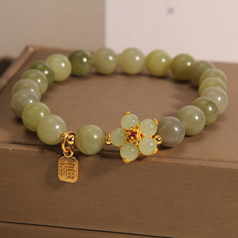 Bracelet porte-bonheur avec breloque en jade vert et fleur de Buddha Stones - image 7