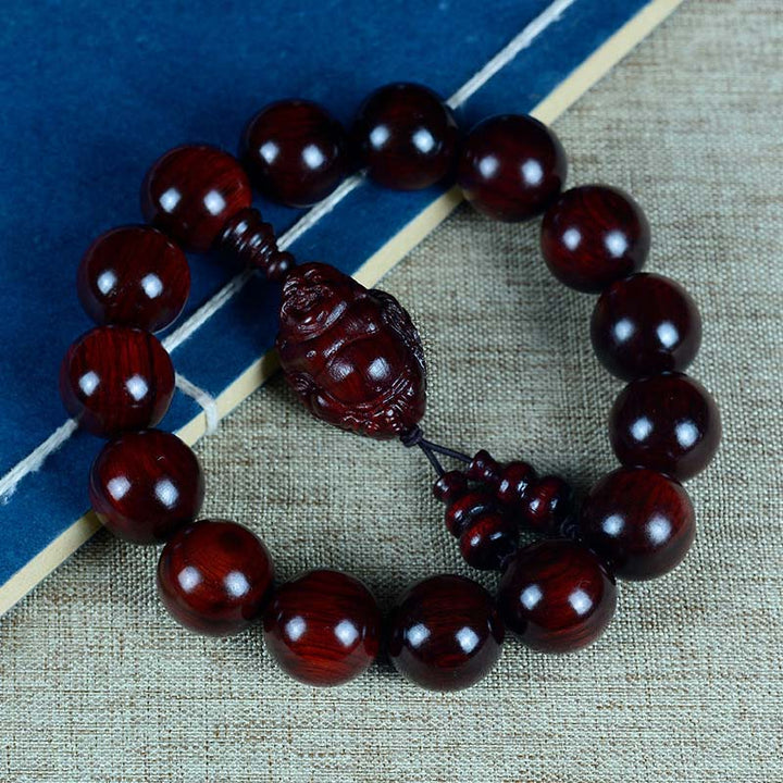 Bracelet Buddha Stones rieur Dieu de la richesse et de la protection en petites feuilles de santal rouge