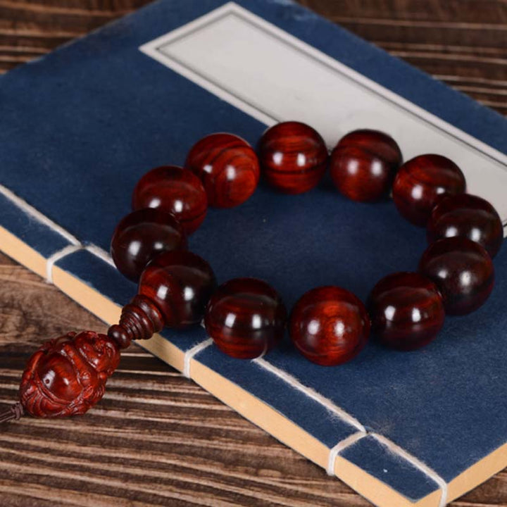Bracelet Buddha Stones rieur Dieu de la richesse et de la protection en petites feuilles de santal rouge