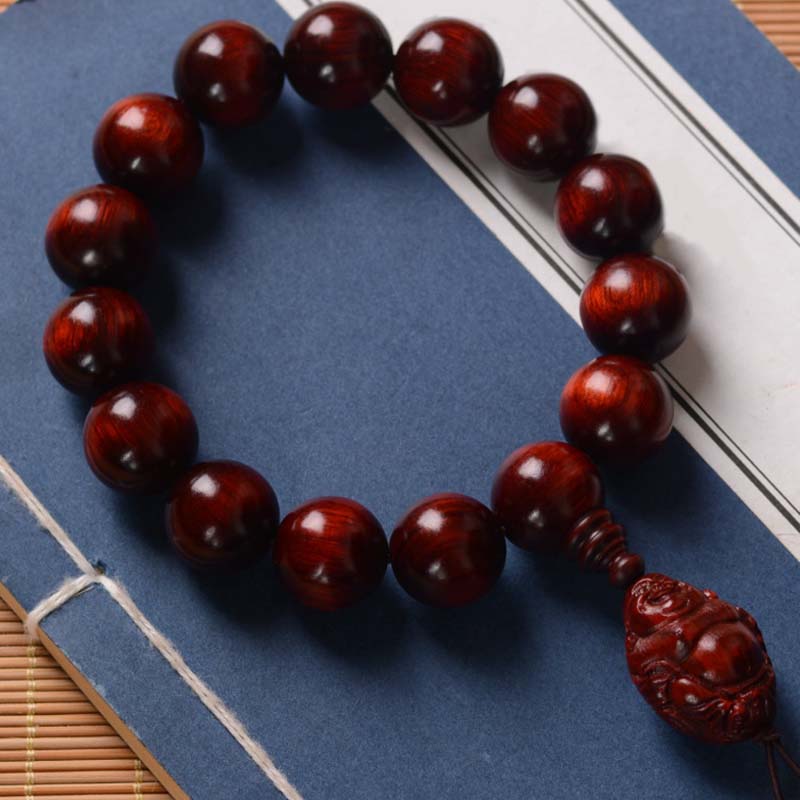 Bracelet Buddha Stones rieur Dieu de la richesse et de la protection en petites feuilles de santal rouge