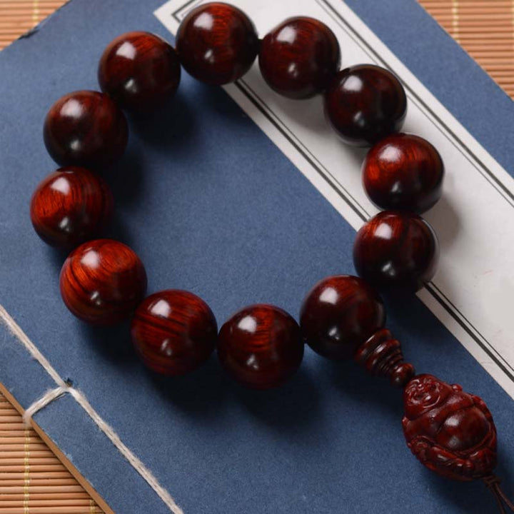 Bracelet Buddha Stones rieur Dieu de la richesse et de la protection en petites feuilles de santal rouge