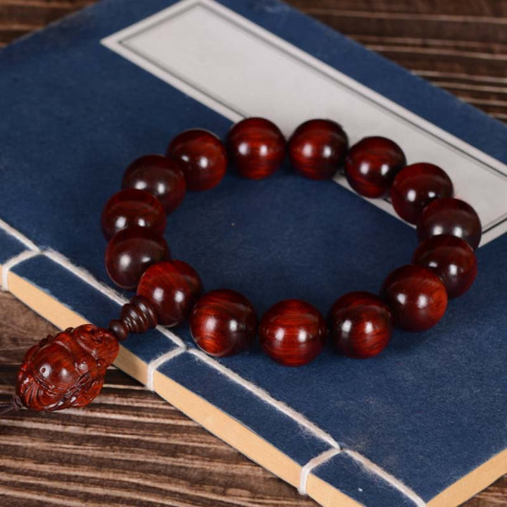 Bracelet Buddha Stones rieur Dieu de la richesse et de la protection en petites feuilles de santal rouge