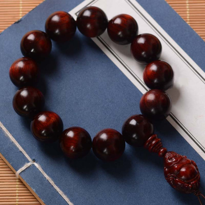Bracelet Buddha Stones rieur Dieu de la richesse et de la protection en petites feuilles de santal rouge