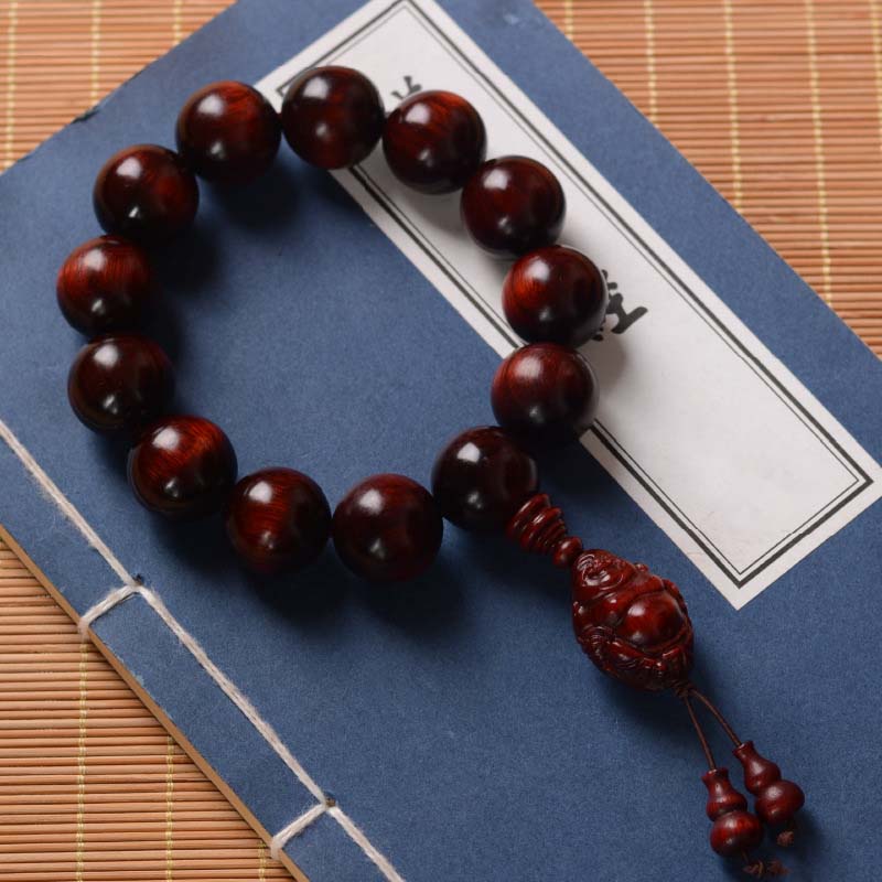 Bracelet Buddha Stones rieur Dieu de la richesse et de la protection en petites feuilles de santal rouge