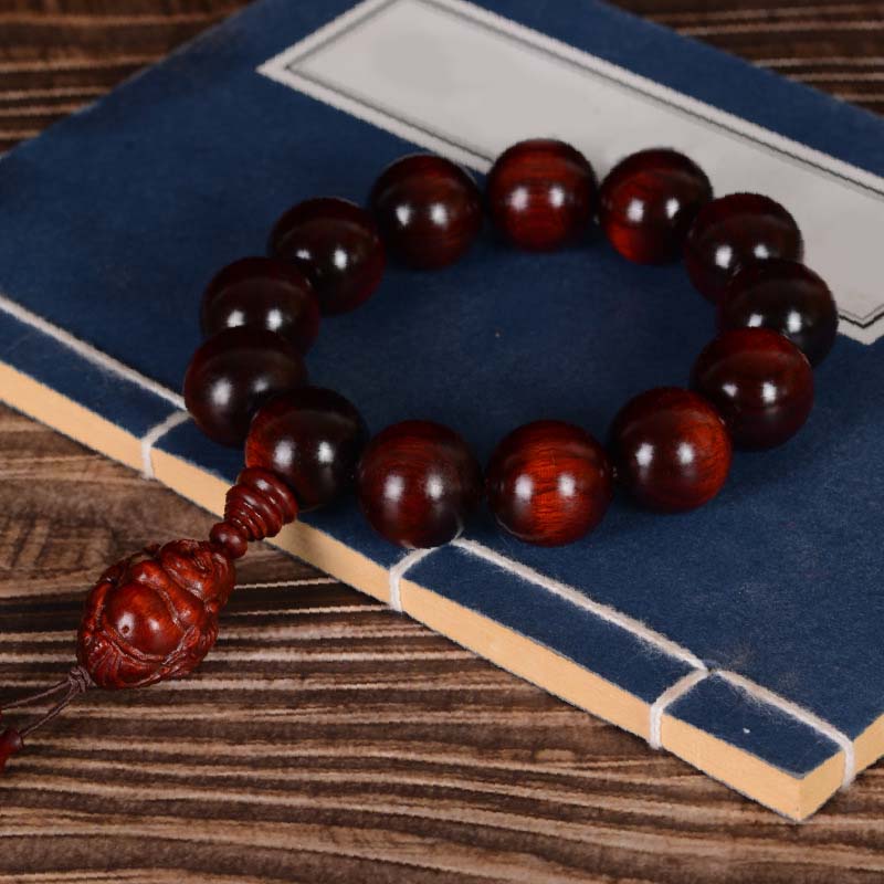Bracelet Buddha Stones rieur Dieu de la richesse et de la protection en petites feuilles de santal rouge