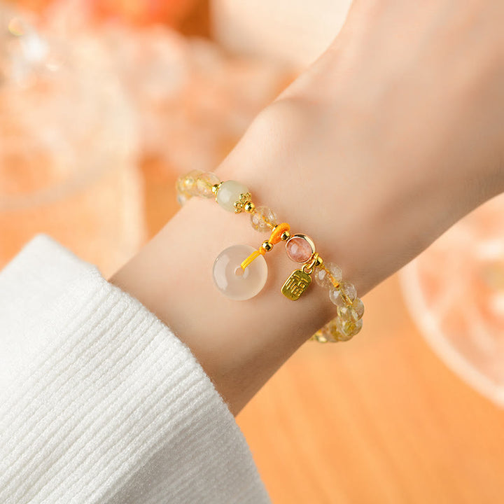 Bracelet de richesse avec boucle de paix et breloque en quartz rutile doré naturel et Buddha Stones