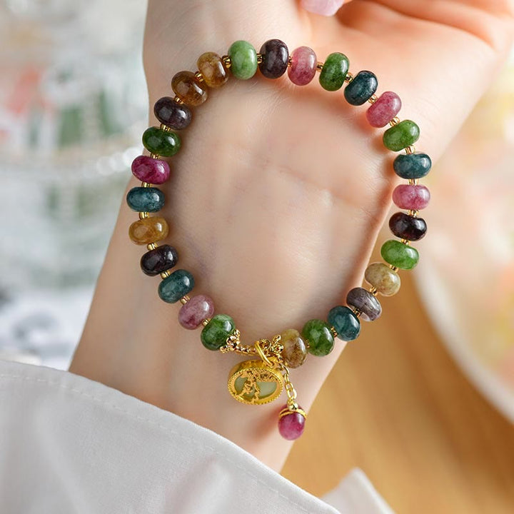 Bracelet d'amour avec breloque en forme de lapin et de fleur en tourmaline colorée et Buddha Stones