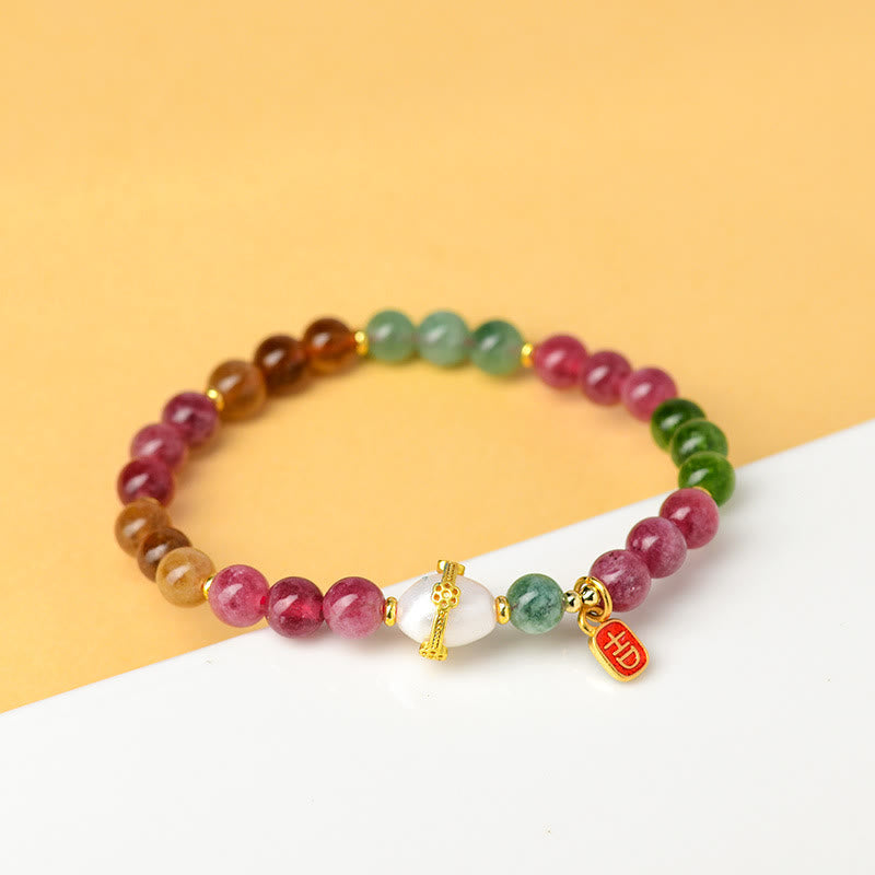 Bracelet de sagesse avec breloque de caractère propice en perles de tourmaline multicolores naturelles de Buddha Stones