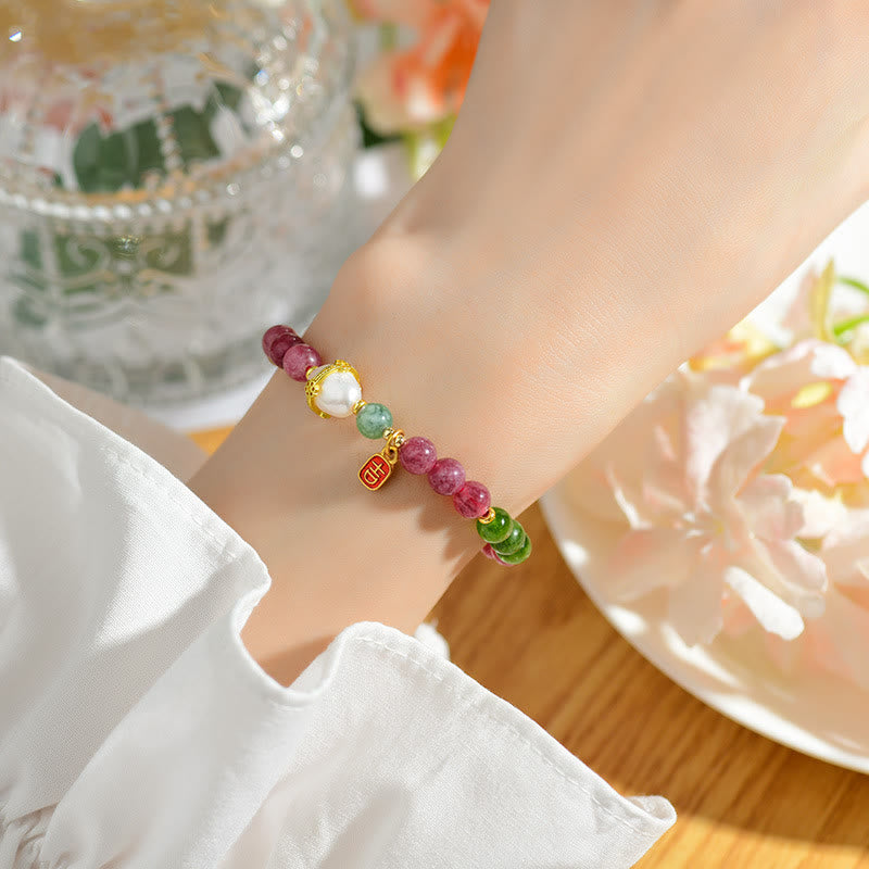 Bracelet de sagesse avec breloque de caractère propice en perles de tourmaline multicolores naturelles de Buddha Stones