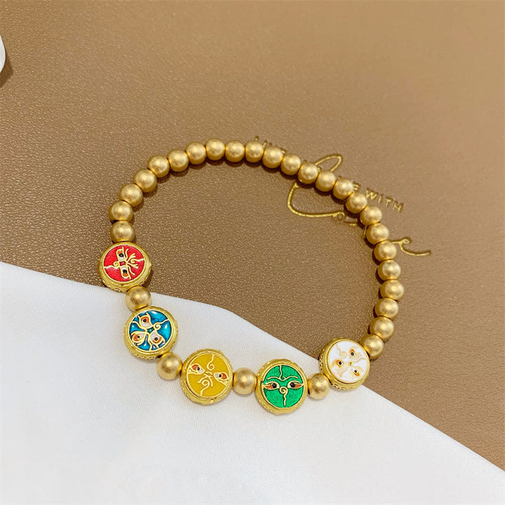Bracelet porte-bonheur Buddha Stones en perles de cuivre représentant les cinq dieux de la richesse