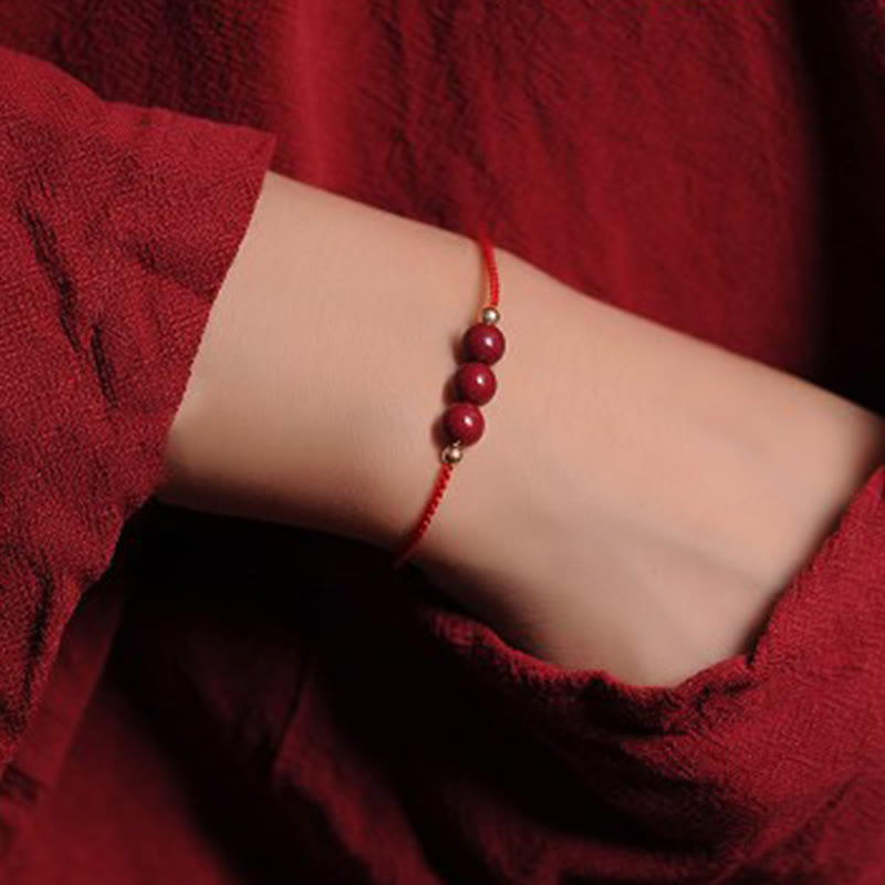 Bracelet tressé en cinabre naturel plaqué or 14 carats de Buddha Stones