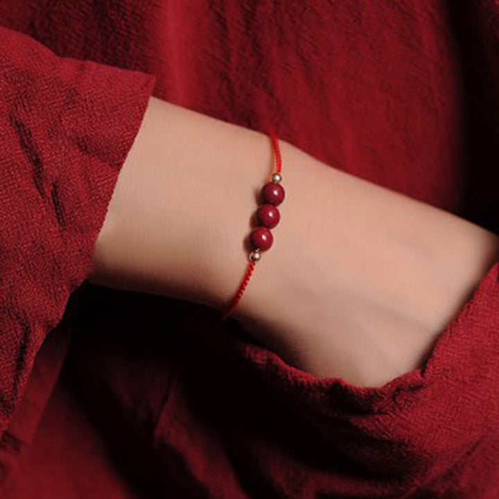 Bracelet tressé en cinabre naturel plaqué or 14 carats de Buddha Stones