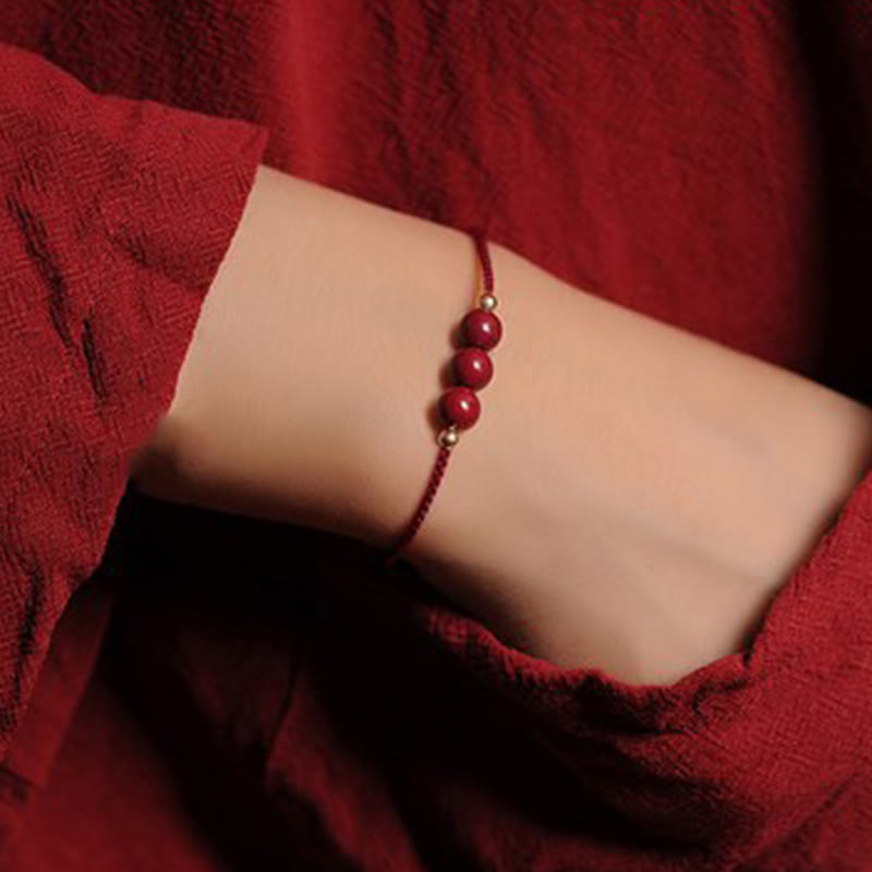 Bracelet tressé en cinabre naturel plaqué or 14 carats de Buddha Stones