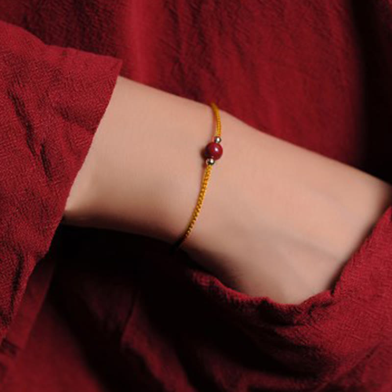 Bracelet tressé en cinabre naturel plaqué or 14 carats de Buddha Stones