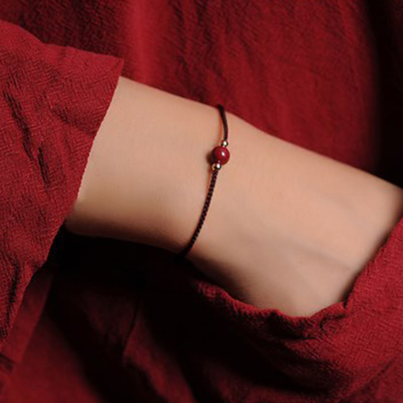 Bracelet tressé en cinabre naturel plaqué or 14 carats de Buddha Stones